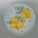 Plate with lemons.